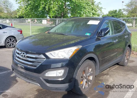 2014 Hyundai Santa Fe Sport 2.4L z USA, uszkodzony, nr VIN 5XYZUDLB8EG231293